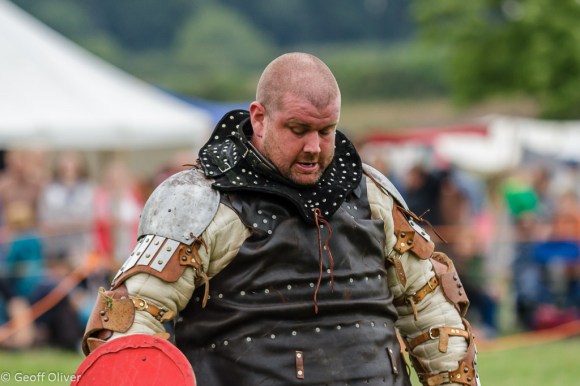 Battle of the Nations - A Fighter takes a breather after losing his helmet - Bosworth Battlefield Anniversary Re-enactment 2013